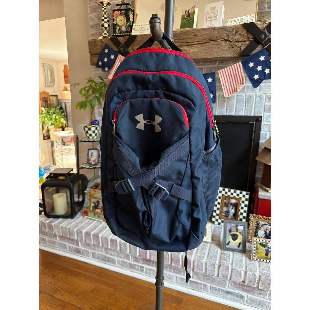 Under Armour Recruit 2.0 backpack in navy blue with distinctive red trim